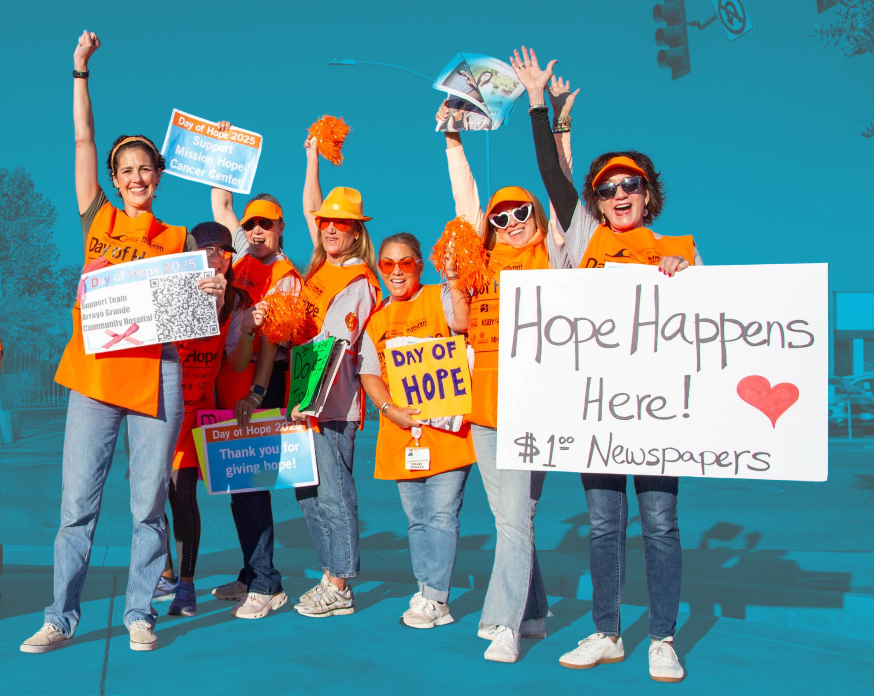 Day of Hope participants selling newspapers on street