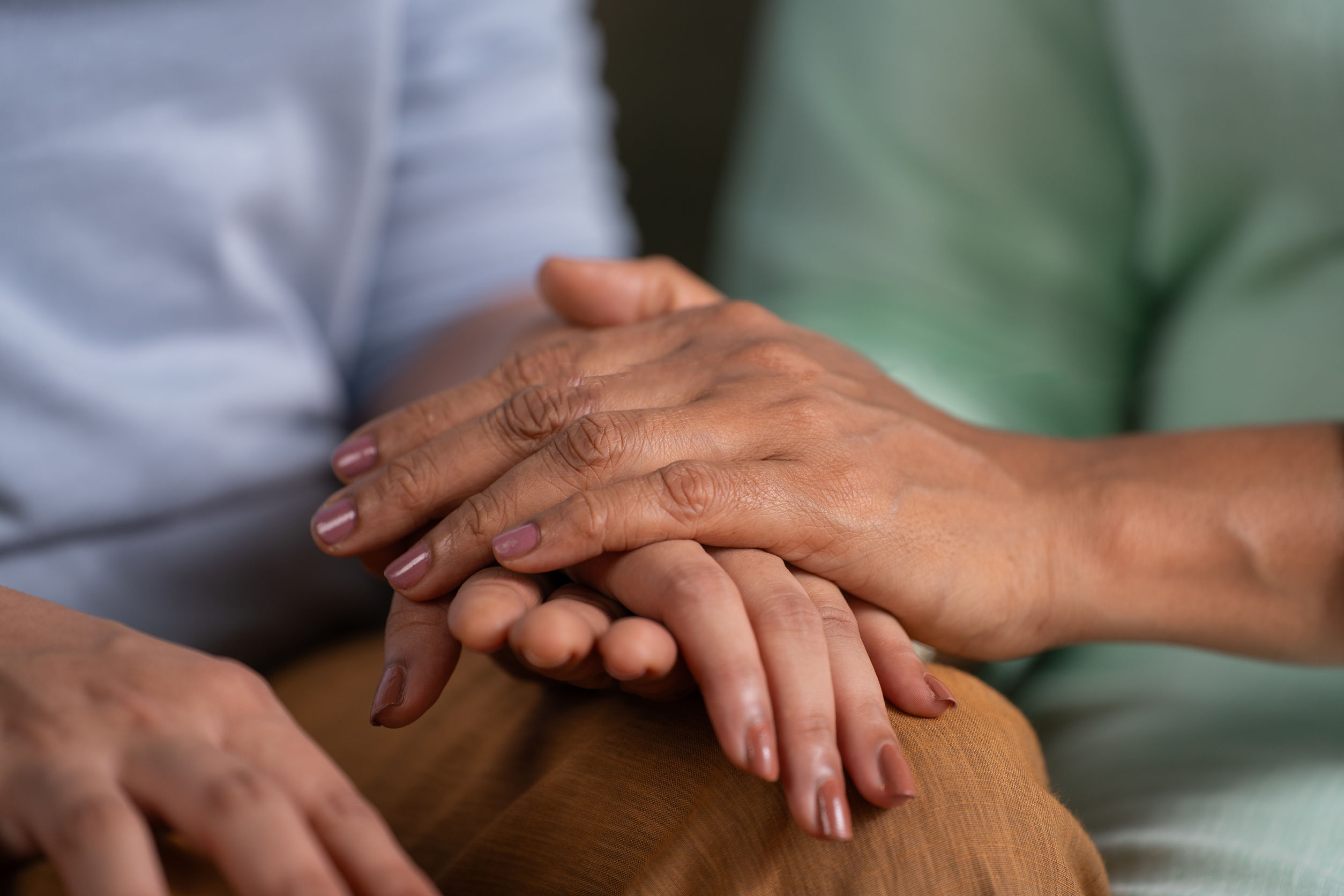 patient and caregiver hands